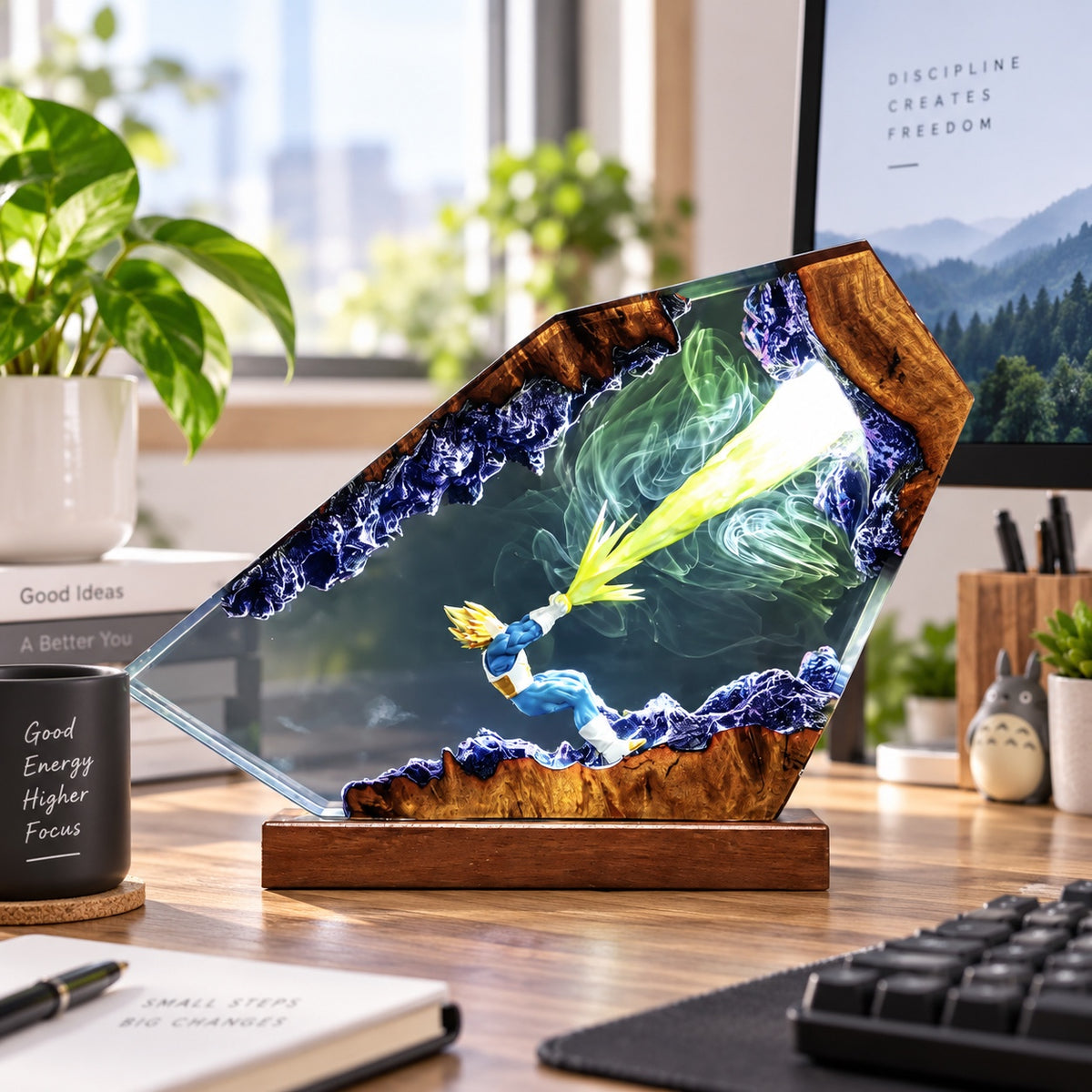 Illuminated resin display lamp with energy warrior scene on a wooden desk