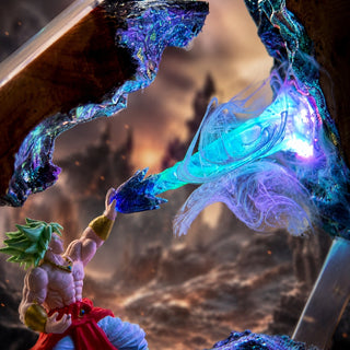 Close-up of illuminated anime resin display with green-haired warrior reaching toward a blue energy effect