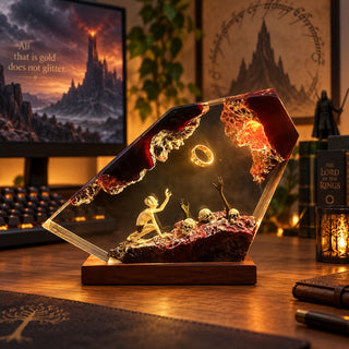 Dark fantasy glowing ring resin lamp in a gaming desk setup