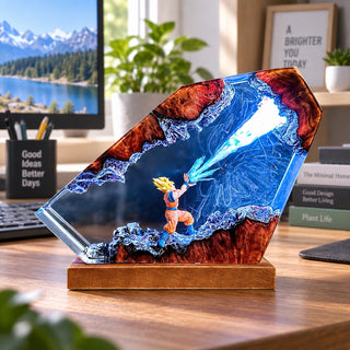 Illuminated anime resin display with blond martial arts character and blue energy effect on a desk