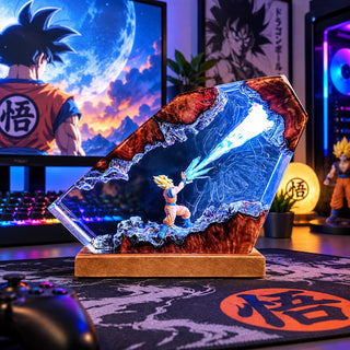 Illuminated anime resin display with blue energy effect in a gaming desk setup