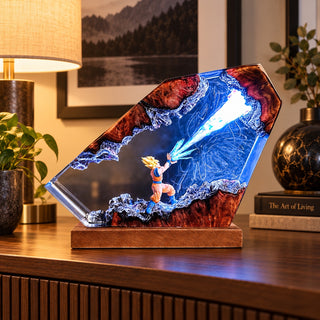 Illuminated anime resin display with blue energy effect on a wood cabinet in warm home decor
