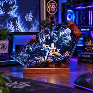 Illuminated anime resin battle display in a blue gaming desk setup